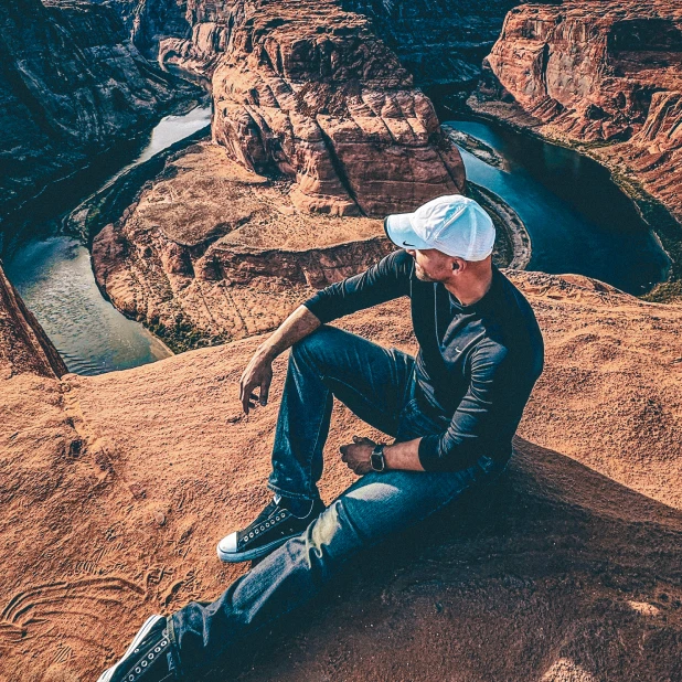 George Hester sitting and looking out at the Horseshoe Bend in Page, Arizona