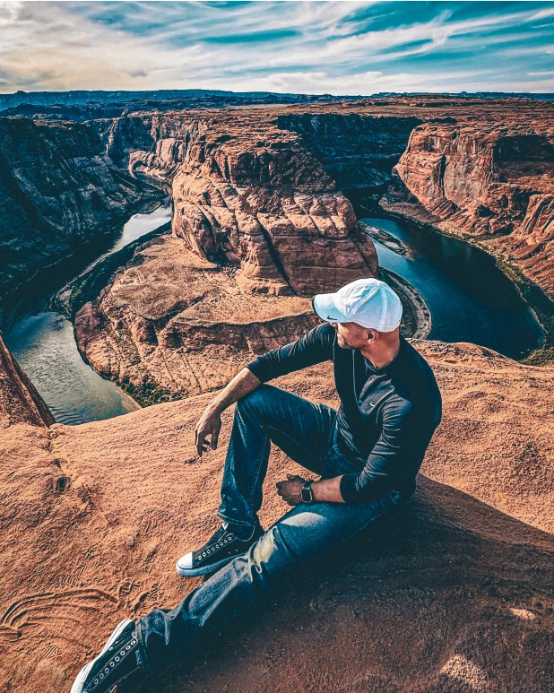 George Hester sitting and looking out at the Horseshoe Bend in Page, Arizona